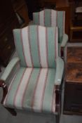 A pair of modern upholstered armchairs having wood frames, Gainsborough style