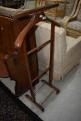 A late 20th century hotel style valet stand