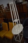 An early 20th century white painted scallop top occasional table on twist legs and a similar