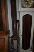A pair of vintage wooden skies and poles- not suitable for those on the piste
