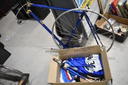 A selection of bicycle racing items including 50's Doniselli Frame, pedals, two vintage Jerseys and