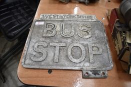 A vintage metal cast bus stop sign for West Yorkshire