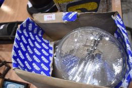A pair of Wipac sealed Beam headlights