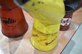 An advertising oil jug for Dextro