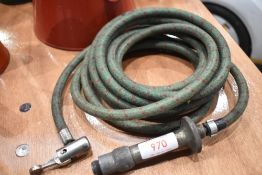 A spark plug tyre inflator