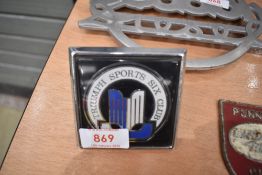A Triumph sports six club badge