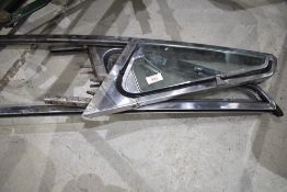 A pair of MGB door side quarter lights