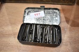 A vintage tin of split pins