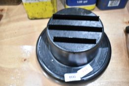 A vintage WW2 blackout headlamp cover