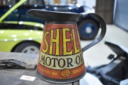 A very early advertising oil jug for Shell Motor oil