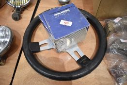 A Triumph TR steering wheel and boss