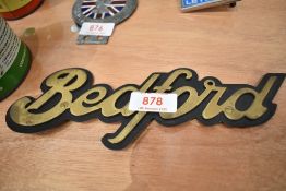 A brass Bedford radiator badge