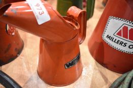 An advertising oil jug for Wesco