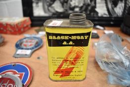 A Black Molly AA tin