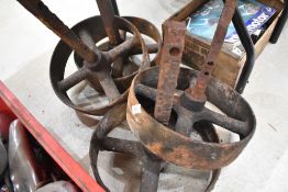 A set of four cast iron truck wheels