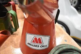 An advertising oil jug for Millers oils