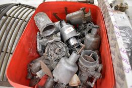 A box of SU carburators and similar parts