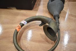 A vintage brass bulb horn