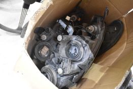 A set of 2004 Mazda MX5 headlights and rear lights
