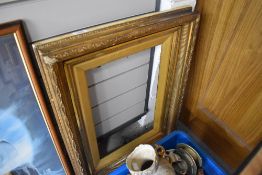 A antique gilt and gesso frame