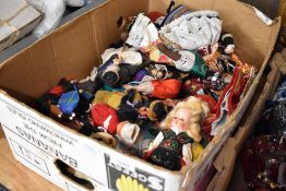 A collection of mid 20th century and later Souvenir Dolls from around the World including Carlson