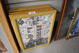 A selection of framed stamp sets