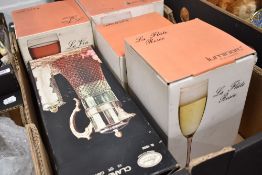 A selection of boxed Luminarc glasses and decanter