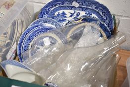 A selection of blue and white wear ceramics and glass oil lamp chimneys