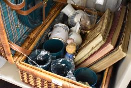 A picnic hamper and ceramics
