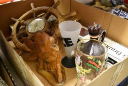 A selection of ornaments including boot glass and fish sculpture