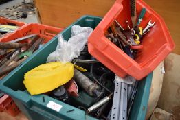 A large plastic container of power tools etc