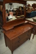 An Edwardian mahogany and inlaid dressing table