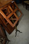 A Victorian oak duet music stand having brass column