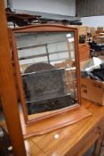 A stag free standing dressing table mirror