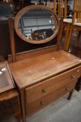 An early 20th Century oak dressing table