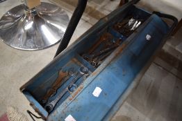 A metal cantilever toolbox and contents