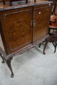 A vintage Epstein style cocktail cabinet