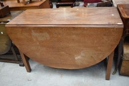 A Victorian mahogany gateleg dining table