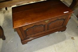 An oak cased media cabinet in a period style