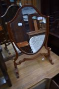 A 19th century mahogany frame toilet mirror of shield shape, width approx. 37cm