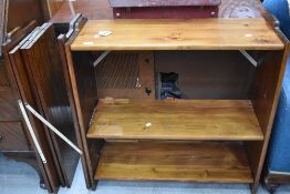 Two open shelves in yellow pine