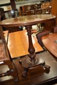A 19th Century mahogany occasional table having bleached oval top on William IV style base