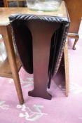 A reproduction gateleg dining table