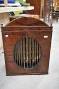 An interesting 19th Century mahogany cabinet having shelved interior and organ pipe front,