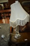 A modern glass table lamp