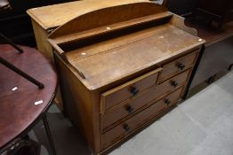 A Victorian scumbled bedroom chest of two over two drawers and ledge back, width approx. 108cm