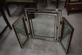 A triptych dressing table mirror