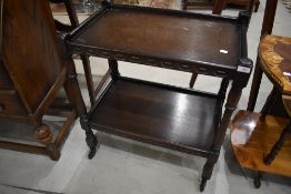 A priory style dark stained tea trolley