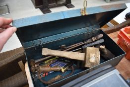 A metal toolbox and contents
