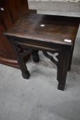 A Gothic Ecclesiastical carved oak stool or occasional table